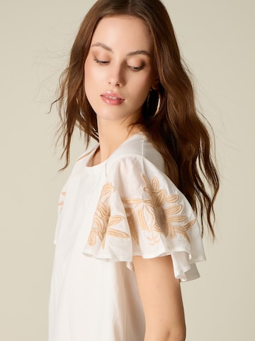 T-shirt oltre en blanc