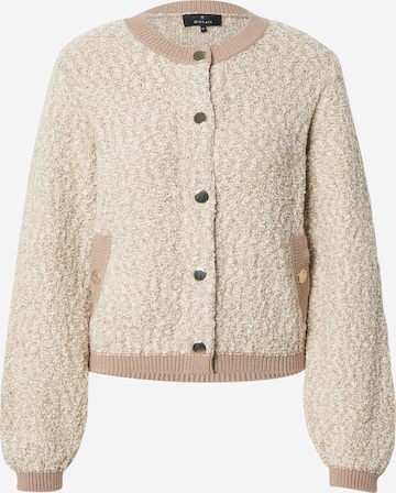 bēšs monari Adīta jaka: no priekšpuses