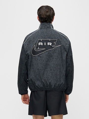 Nike Sportswear Between-season jacket 'AIR' in Blue: front