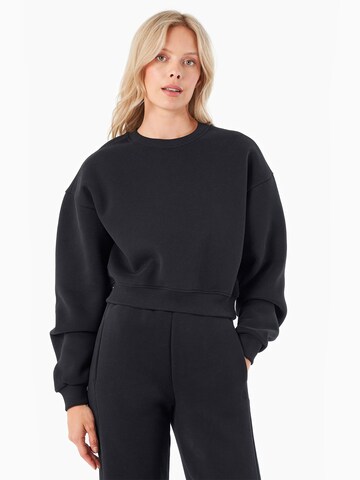 Organication Sweatshirt in Schwarz: Vorderseite