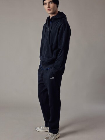 OWN Off With Nature Regular Broek 'Joggers Felpati Dritti' in Blauw