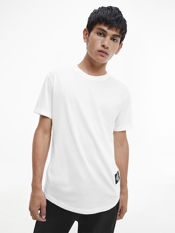 T-Shirt Calvin Klein Jeans en blanc : devant