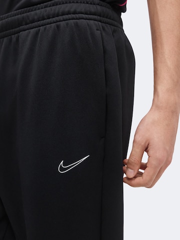 Effilé Pantalon de sport 'Flex' NIKE en noir