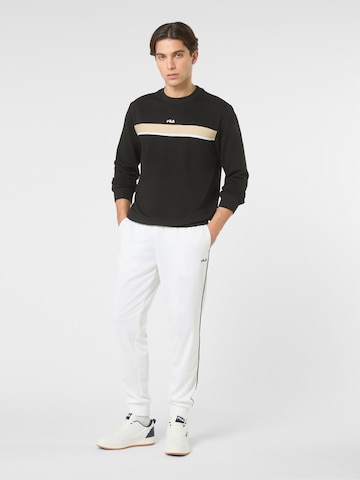 FILA Regular Housut 'SAGANO regular track pants' värissä valkoinen