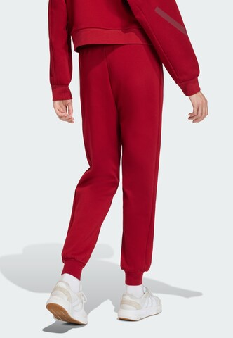 ADIDAS SPORTSWEAR Tapered Pants 'Z.N.E' in Red