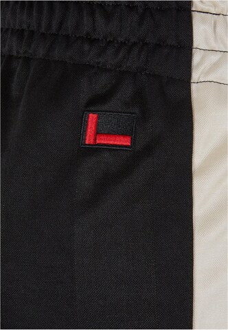 Regular Pantaloni sport 'Corporate' de la FUBU pe negru