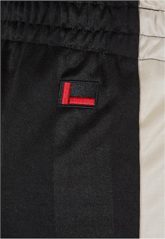 FUBU Normalny krój Spodnie sportowe 'Corporate' w kolorze czarny