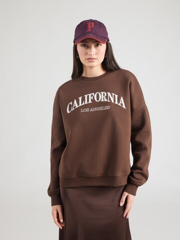 PIECES Tréning póló 'PCTAMY' - barna: elől