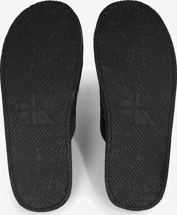 Calvin Klein Slippers in Black