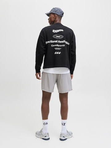 Sweat-shirt 'JCOSIGNAL' JACK & JONES en noir