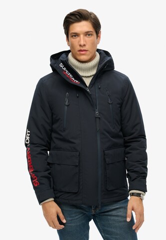 Veste mi-saison Superdry en bleu : devant