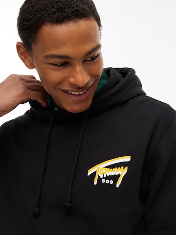 Tommy Jeans Collegepaita 'NYC' värissä musta