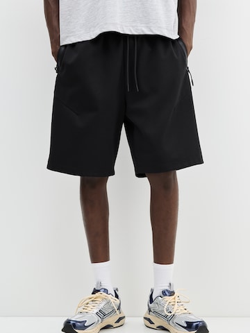 Wide leg Pantaloni di Pull&Bear in nero: frontale