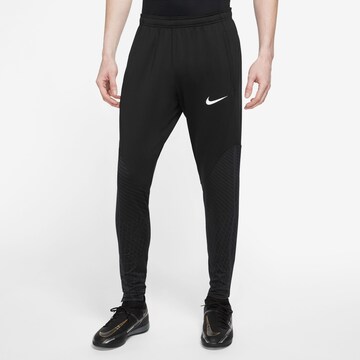 Coupe slim Pantalon de sport 'Strike' NIKE en noir : devant