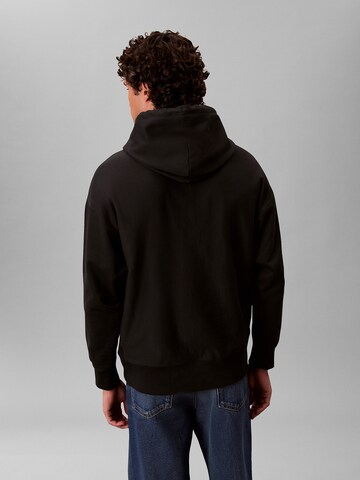 Sweat-shirt 'Premium' Calvin Klein Jeans en noir