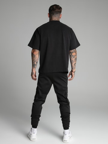 Tapered Pantaloni di SikSilk in nero