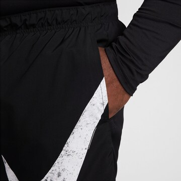 NIKE Loose fit Workout Pants 'Challenger Swoosh' in Black