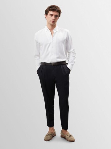 Antioch Tapered Pleat-front trousers in Grey: front