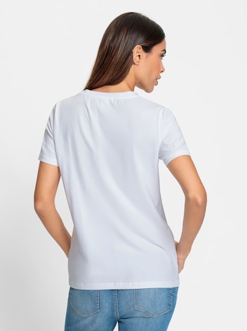 Tricou de la heine pe alb