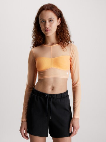 T-shirt Calvin Klein Jeans en orange : devant