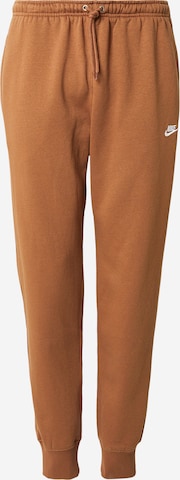 ruda Nike Sportswear Siaurėjantis Kelnės 'CLUB': priekis