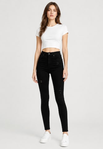Skinny Jeans di Elara in nero