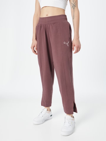 PUMA Loose fit Sports trousers in Purple: front