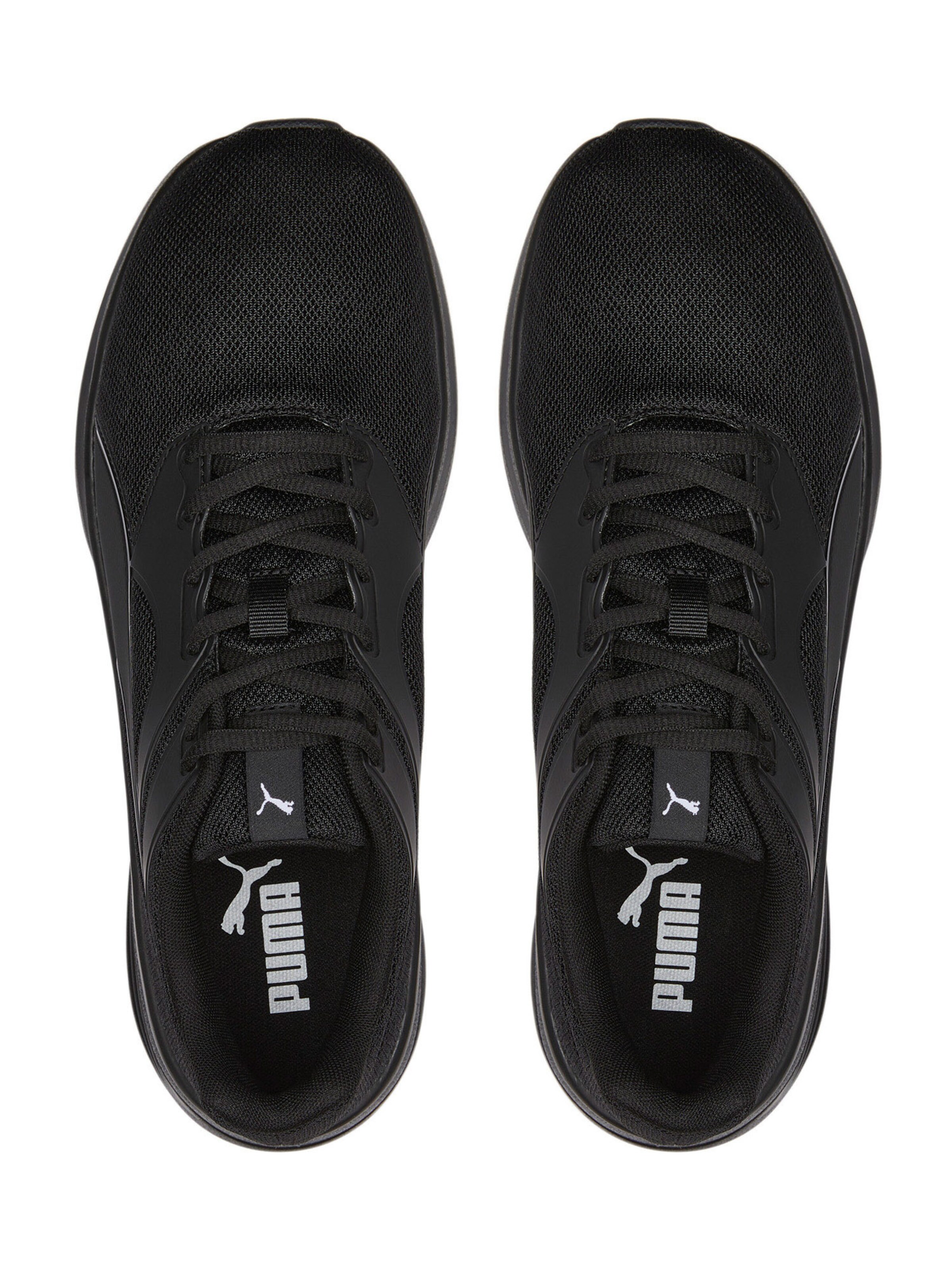 Chaussure de course 'Transport' PUMA en noir