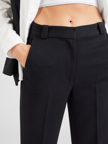 Wide leg Pantaloni con piega frontale di & Other Stories in nero
