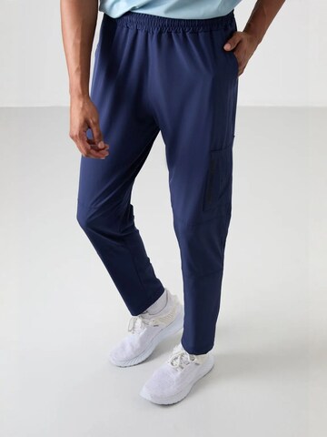 Tommy Life Regular Trousers in Blue: front