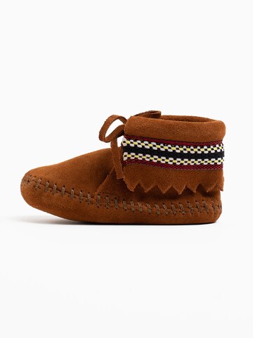 Minnetonka - Botas de nieve 'Braid' en marrón