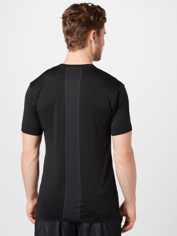 T-Shirt fonctionnel NIKE en noir