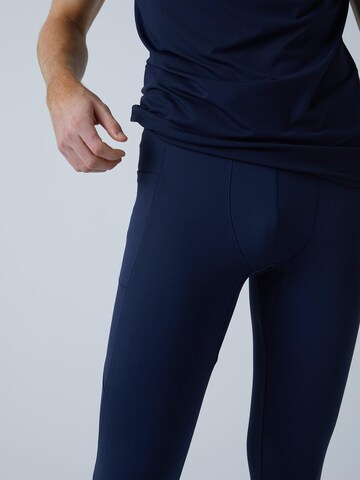 Coupe slim Pantalon de sport 'Long Running Tights' SPORTKIND en bleu
