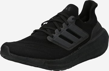 ADIDAS PERFORMANCE Running shoe in Black: front