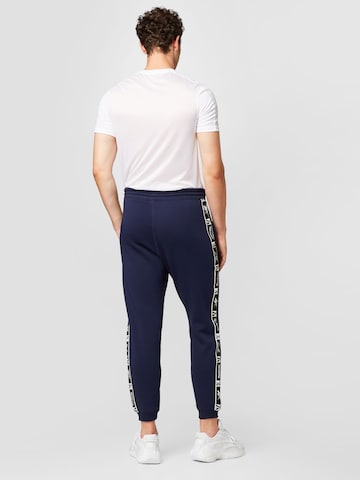 Reebok Sport Sports trousers in Blue