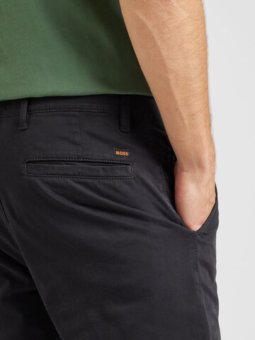 Tapered Pantaloni eleganți de la BOSS pe negru