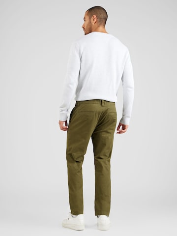 Slimfit Pantaloni chino 'AUSTIN' di Tommy Jeans in verde