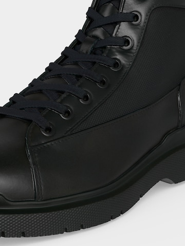 Bottes à lacets HUGO en noir