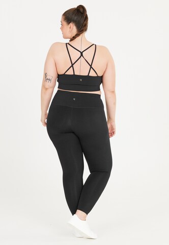 Q by Endurance Medium Support Sport-BH 'Thalia' in Schwarz
