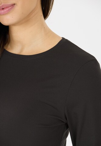 Athlecia Performance shirt in Black