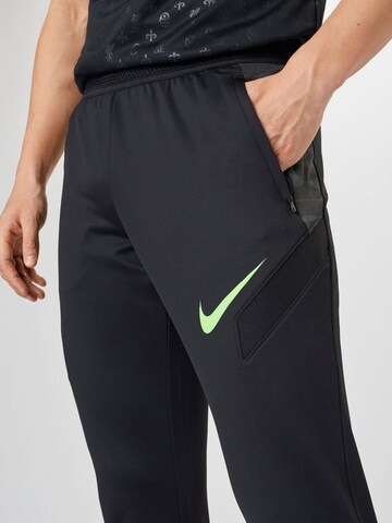 Coupe slim Pantalon de sport 'Strike' NIKE en noir