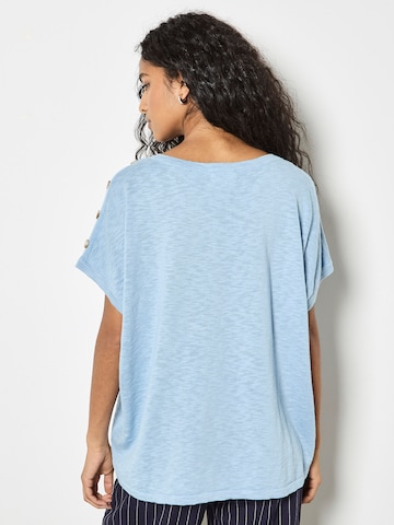 Haut ' ' Apricot en bleu