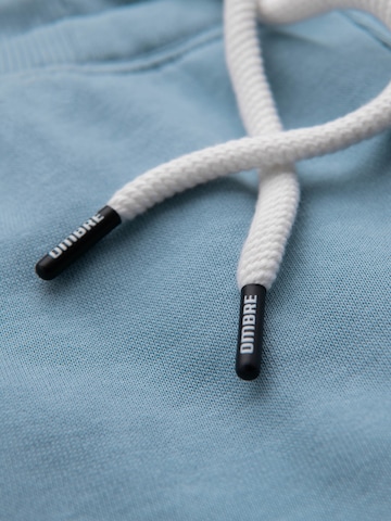 Effilé Pantalon de sport Ombre en bleu
