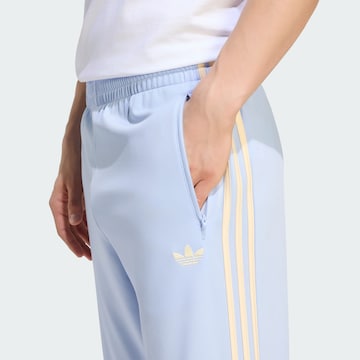 regular Pantaloni 'Firebird' di ADIDAS ORIGINALS in blu