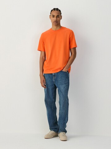 T-Shirt Next en orange