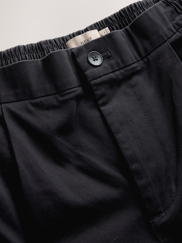 Next Slimfit Lærredsbukser i sort