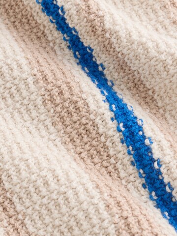 Next - Mono en beige