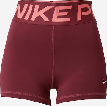 sarkans NIKE Sporta bikses: no priekšpuses