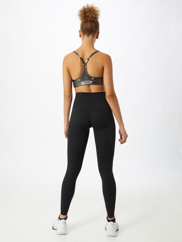 Skinny Pantaloni sportivi 'One Luxe' di NIKE in nero