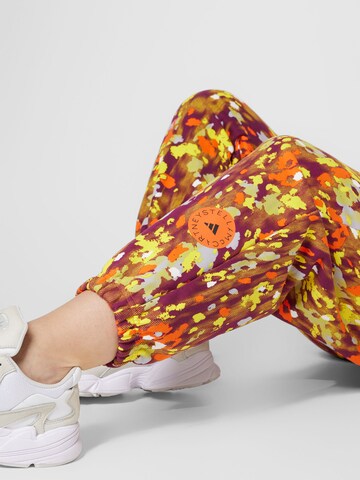 ADIDAS BY STELLA MCCARTNEY Zwężany krój Spodnie sportowe 'Printed ' w kolorze mieszane kolory